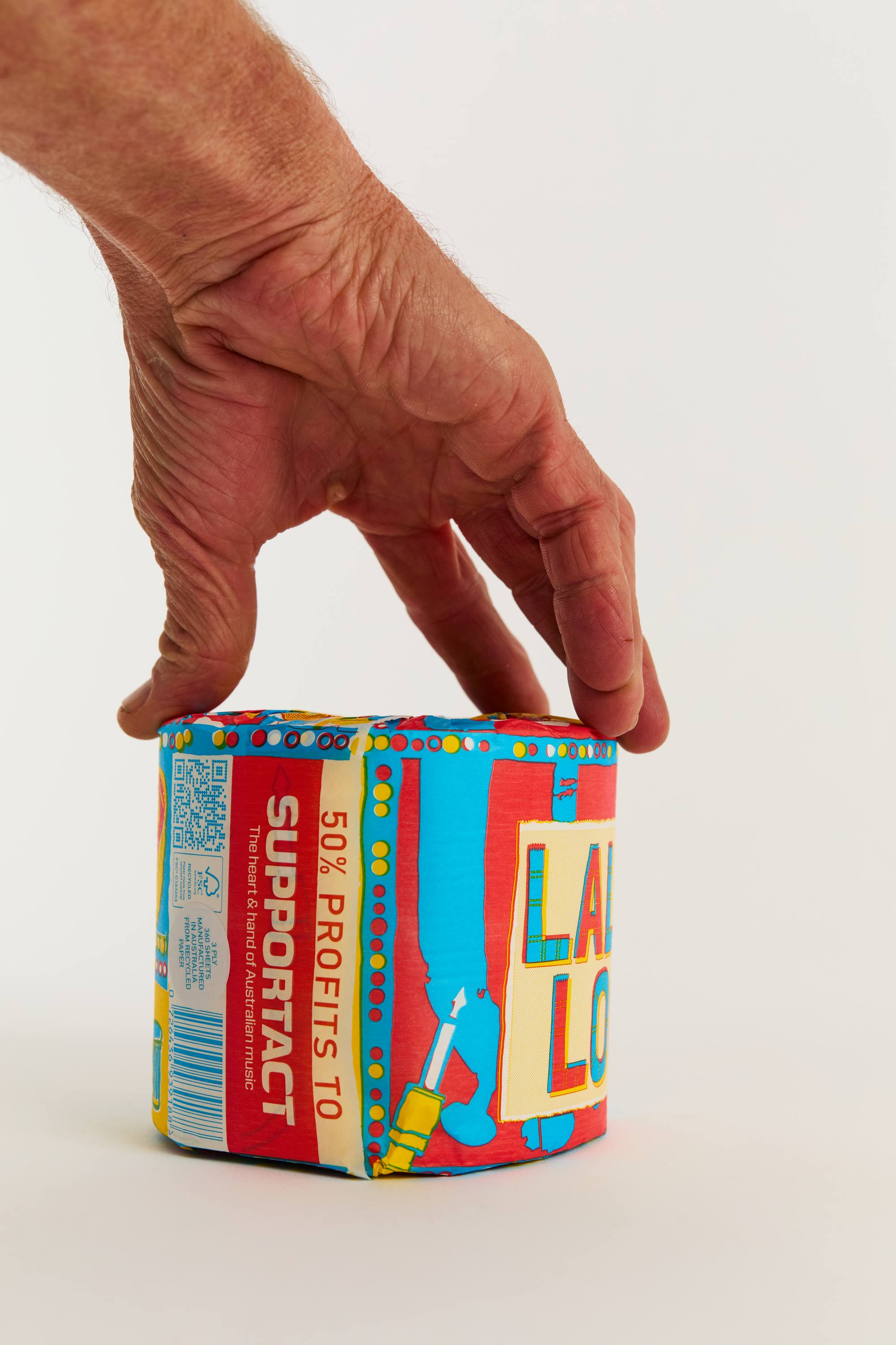 A hand holding a LaLaLoo roll